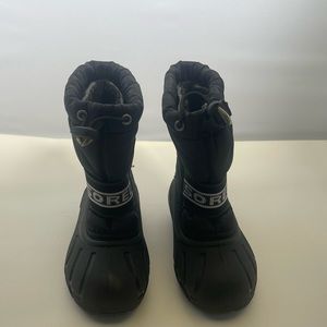 Gently used kids Sorel.